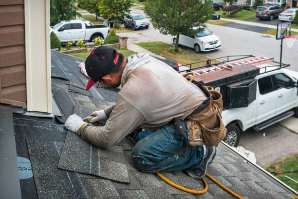 Professional Emergency Roof Repair technician working in Warnock, OH